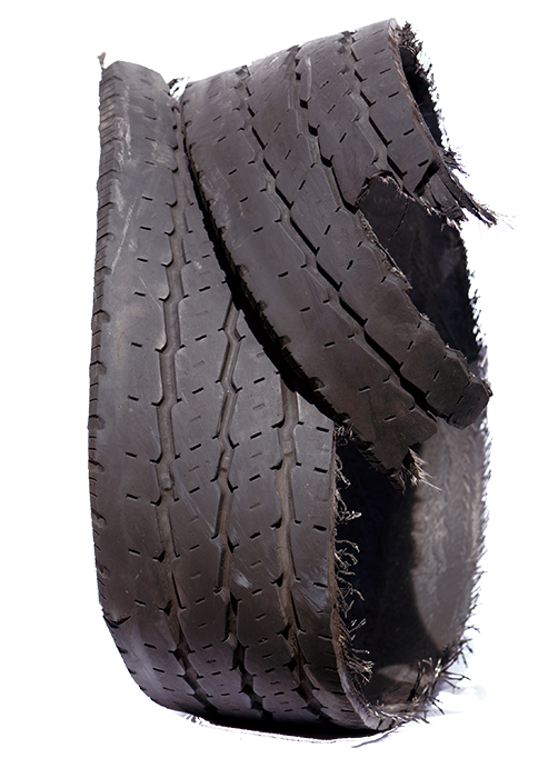 A potential tire case is commonly identified by a tread that has separated from the carcass: 